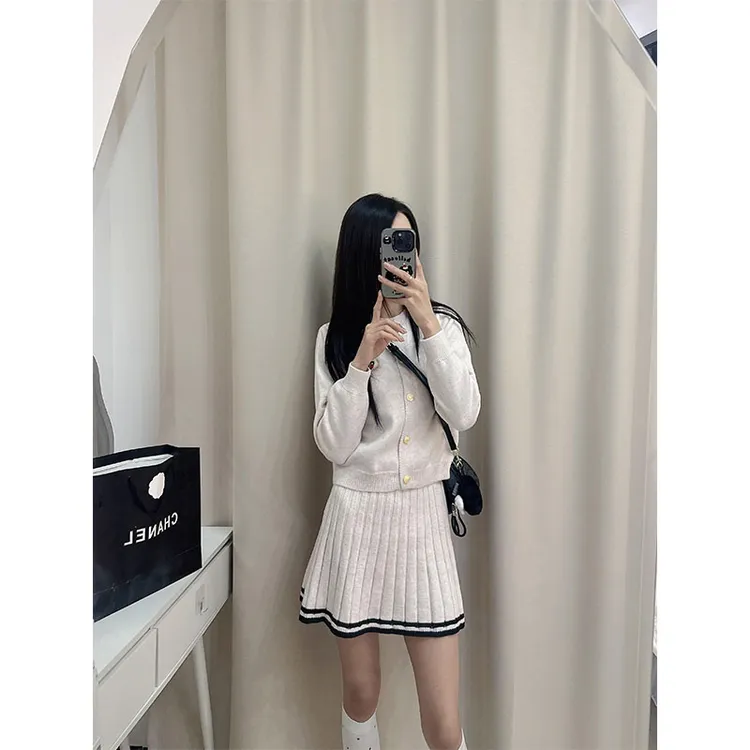 韩版学院风时尚套装高级感小众针织长袖开衫上衣高腰a字半身裙潮