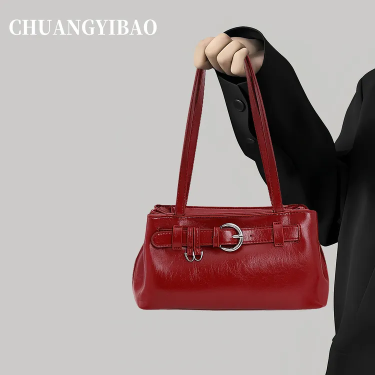 红色手提法棍包包女式2025新款秋冬高级感轻奢小众设计婚包腋下包