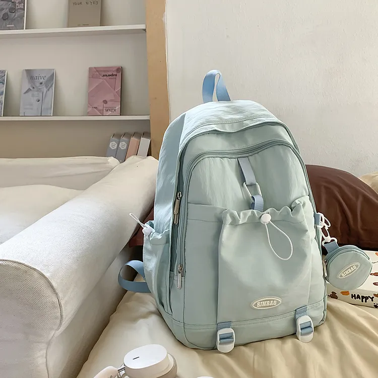 新款大学生简约书包初中高中生少女旅行双肩包大容量百搭背包