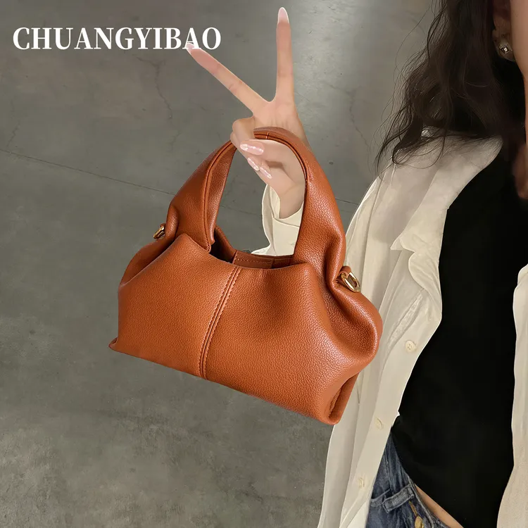 韩版小众时尚手拎包女2025秋冬新款潮高级感单肩斜挎包百搭饺子包