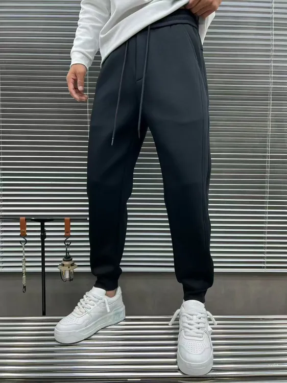 6099冬季男款加厚舒适简约潮流小脚休闲卫裤