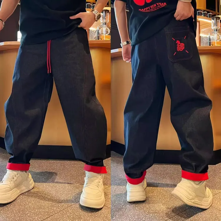 冬季新款个性痞帅裤脚卷边加厚磨毛刺绣牛仔裤男士弹力百搭弯刀裤