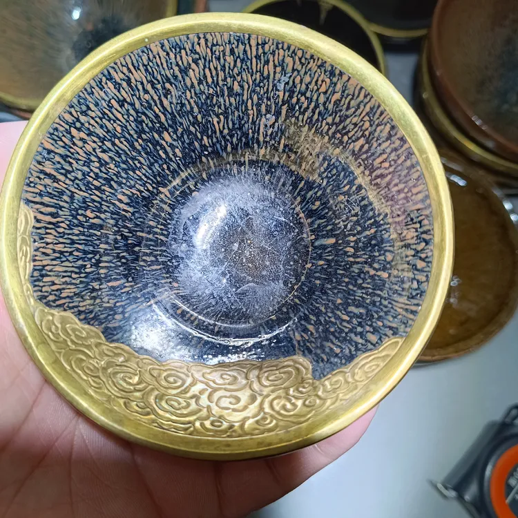 ​水吉窑宋建盏，磨口包铜口，缺处錾祥云，口径9.5高5厘米