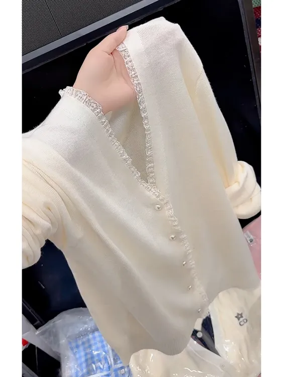 今年流行漂亮别致绝美毛衣宽松软糯慵懒松弛感米白色针织开衫女秋