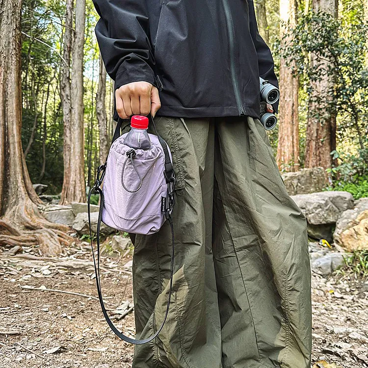 抽绳纯色水壶包男女户外休闲超轻防泼水便携小包百搭手机包单肩