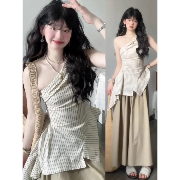 法式气质不规则斜肩条纹吊带上衣夏季高腰宽松显瘦A字伞裙两件套