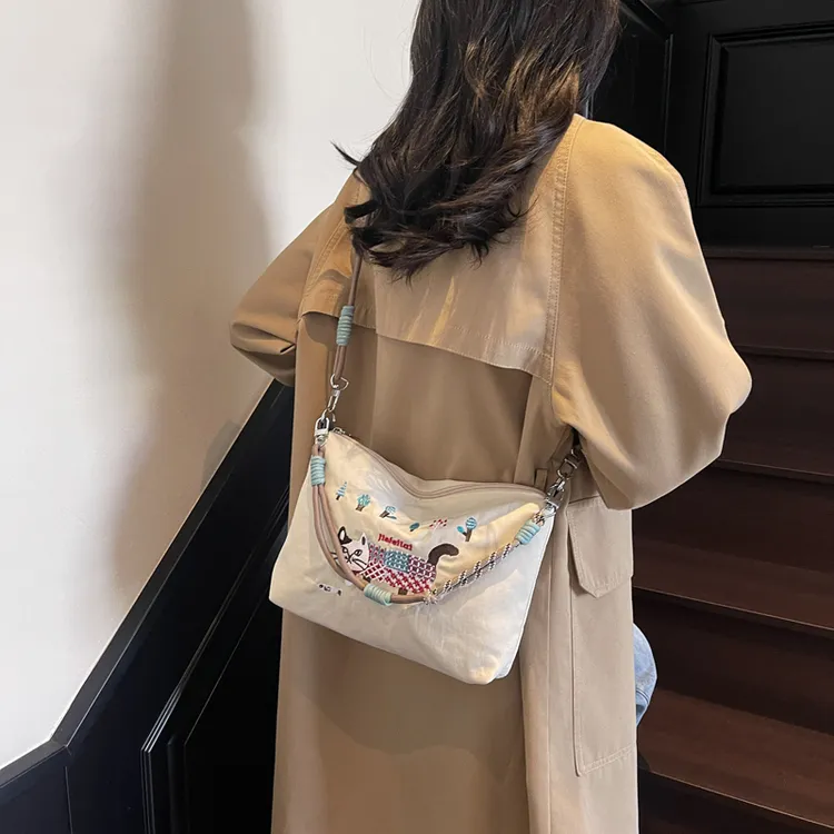 出口韩国春夏25猫咪刺绣防泼水手提斜挎单肩包购物袋