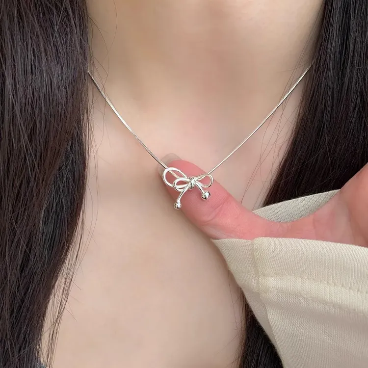 铜合金项链 绳结项链女款2025新款爆款蝴蝶结吊坠高级感锁骨链夏