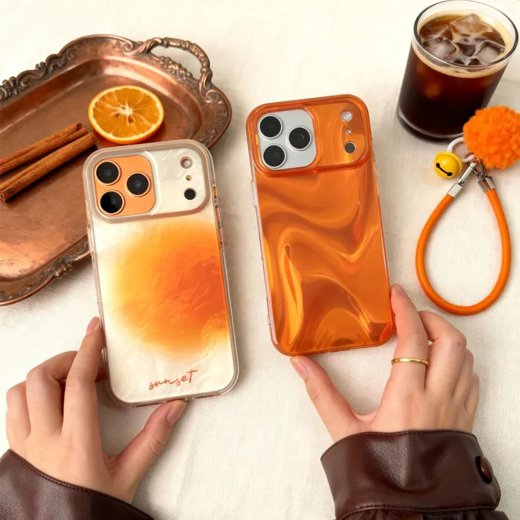 高级秋冬橙色手机壳适用苹果17promax/16pro/15防摔imd带手绳贵气