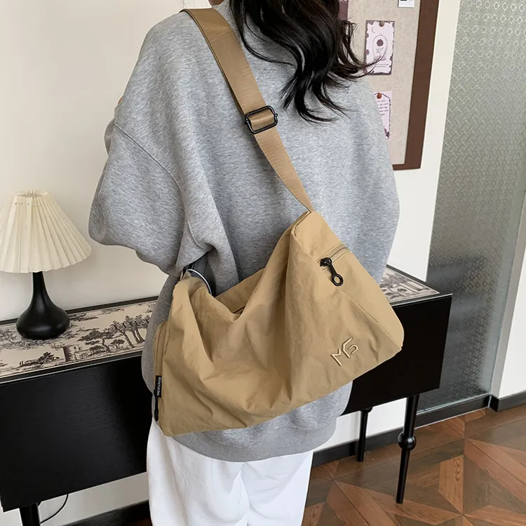 2025男女同款新百搭时尚休闲日常出门便携多功能收纳旅行包单肩包