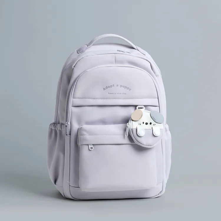 菊仙子时尚初中生书包护脊超轻便减负大容量休闲双肩包潮流背包