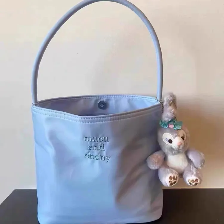 韩国much and eboy2025新款水桶包包女简约休闲百搭手提包尼龙腋