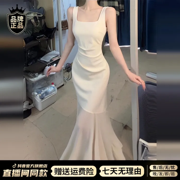 白色吊带连衣裙子女早秋季2025新款海边度假风高级感收腰鱼尾长裙