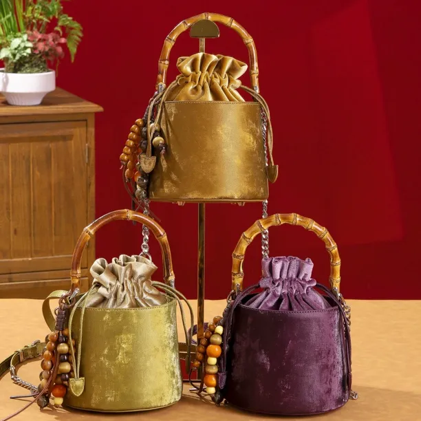 2026年新款琥珀流光风斜挎包新中式手拎包新年包水桶包链条单肩包