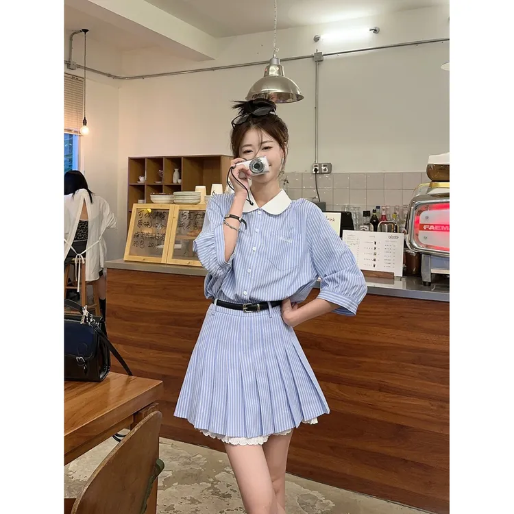 学院风蓝白条纹套装女春季2025新款娃娃领衬衫蕾丝拼接半裙两件套