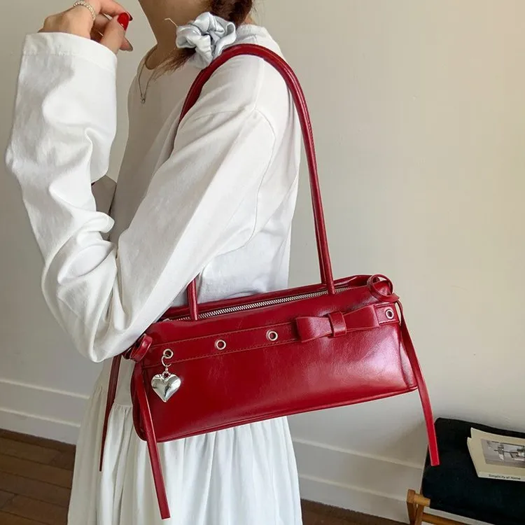 2025夏季新款ins风韩系丝光感蝴蝶结单肩纯欲法棍腋下包