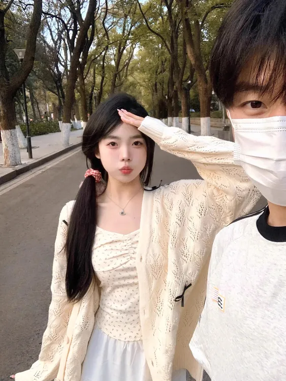学院风镂空蝴蝶结薄款针织开衫女春款2025新款宽松休闲外套上衣