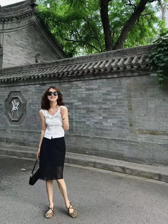 2025夏季新款简约休闲单排扣无袖背心上衣百搭高腰显瘦半身裙套装