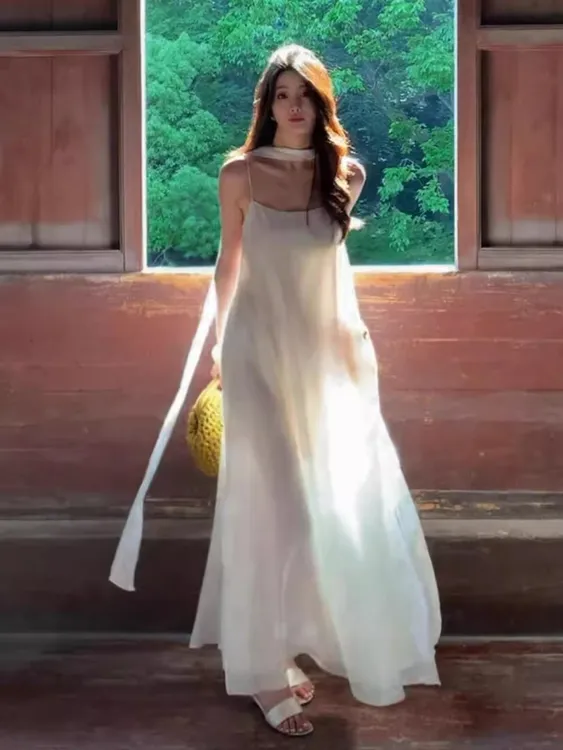 2025新款度假风穿搭白色无袖吊带连衣裙夏季法式初恋气质长裙4412