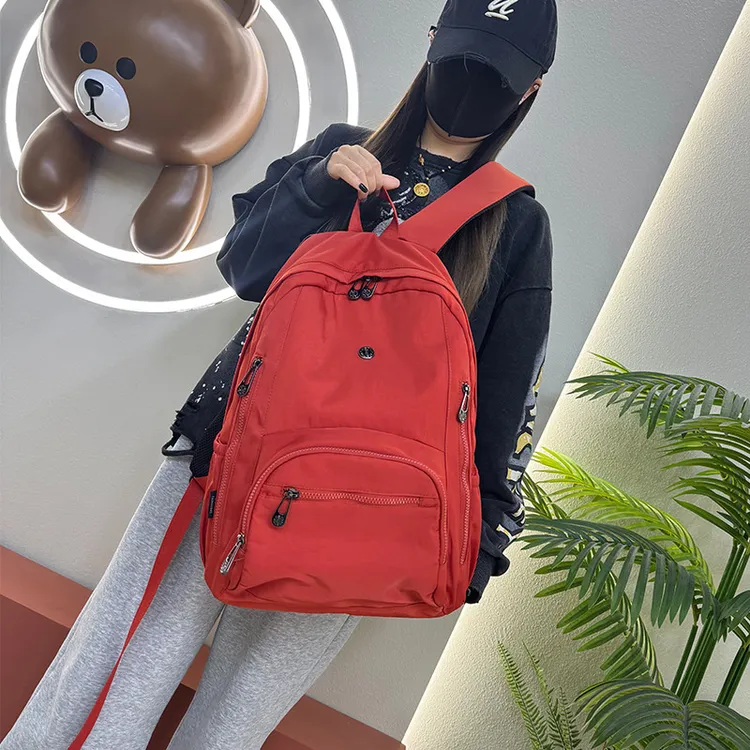 休闲双肩背轻便韩版潮流简约百搭多功能男士女士运动户外便携双肩