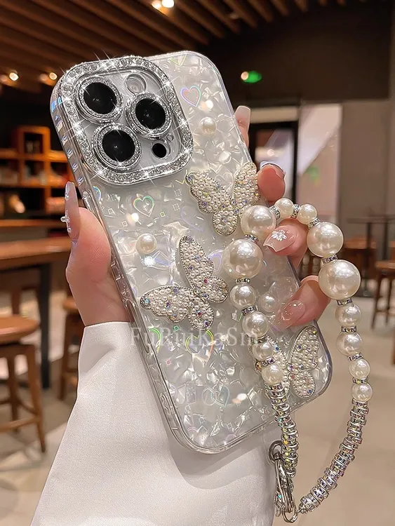 适用苹果16promax手机壳15立体珍珠蝴蝶新款14pro自带水钻挂链13