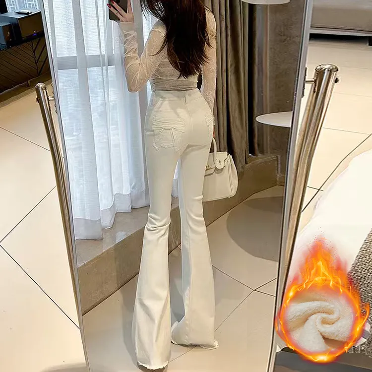 米白蝴蝶结加绒高腰微喇牛仔裤女2025秋冬新款显瘦时尚设计感毛边