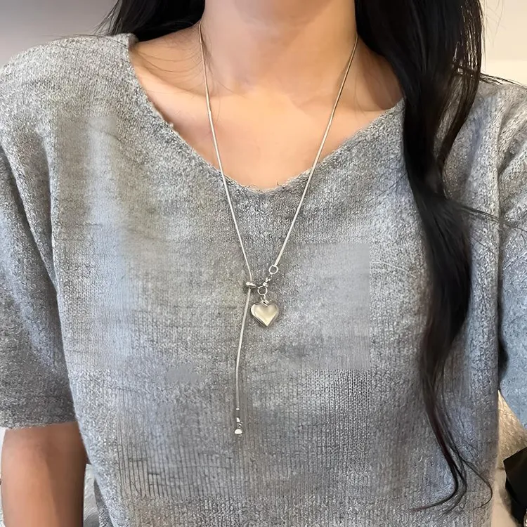 铜合金项链 简约银色爱心项链女长款秋冬气质毛衣链轻奢高级感