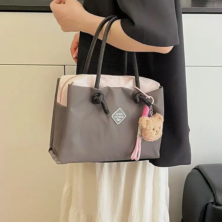 撞色新款多层网红多巴胺简约字母手提袋妈咪包上班通勤手拎包女包