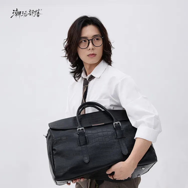 潮玩部落饕餮收纳包便携手提斜挎包女出差专用飞机包大容量旅行包