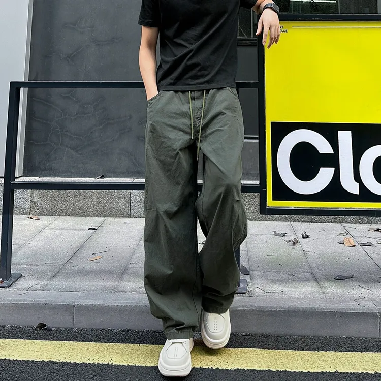 QUALCOMM军绿色潮流拼接褶皱设计伞兵休闲裤男款秋季百搭休闲长裤
