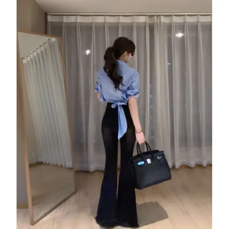 夏季穿搭一整套2025新款韩版气质设计感条纹衬衫微喇牛仔裤两件套