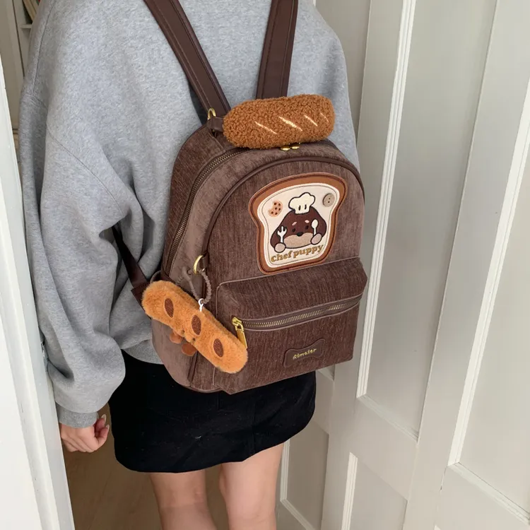 可爱双肩包包女式2025新款学院风百搭大容量通勤背包中小学生书包