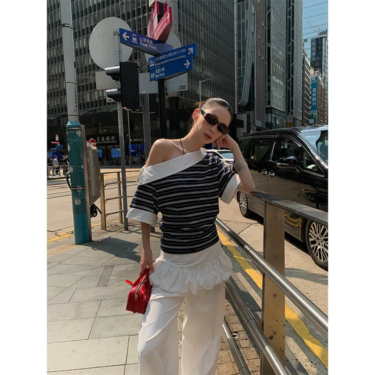 2025夏季新款ins设计感斜肩条纹短袖上衣女配高腰显瘦休闲长裤