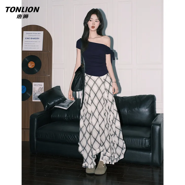 唐狮小众ins浅咖格纹度假风半身裙女不规则A字休闲大摆气质长裙