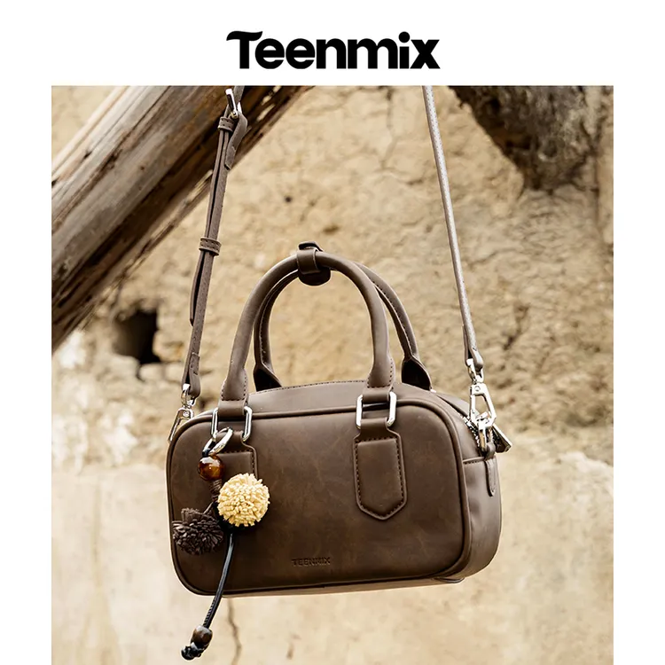 天美意女包2025新款牛皮简约保龄球包复古手提包小包轻奢斜挎包潮