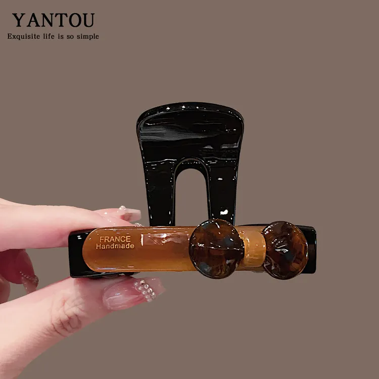 韩国东大门2025新款亚克力蝴蝶结抓夹女后脑勺盘发鲨鱼夹头饰发夹