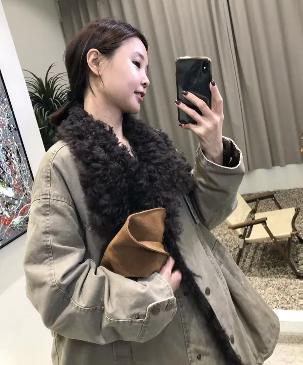 "芬兰漫雪"90白鹅绒羽绒派克服时尚气质2025皮毛一体毛领女士外套