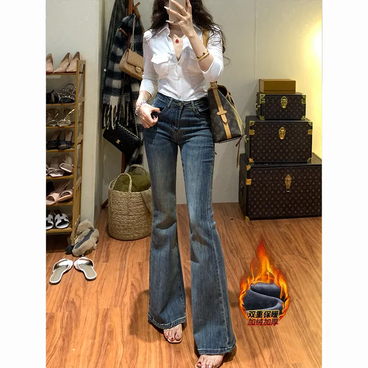 高腰线条刺绣加绒微喇牛仔裤女2025年冬季新款设计感显瘦喇叭长裤