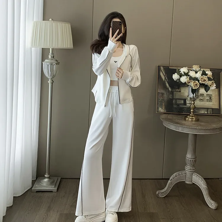 白色连帽运动休闲套装2024春秋装女时髦高级感炸街阔腿裤三件套
