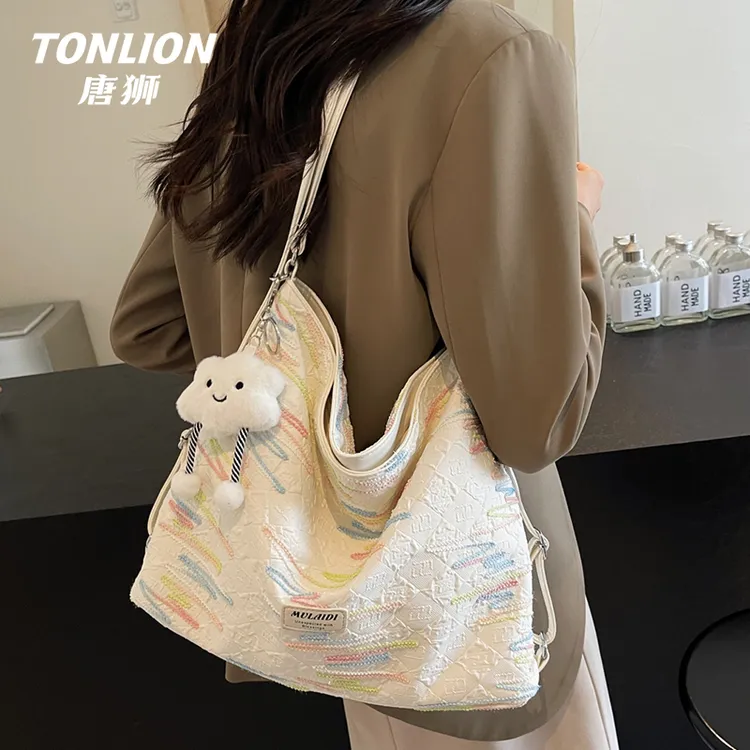 tonlion/唐狮单肩斜挎包休闲软面大容量通勤包ins复古休闲大学生