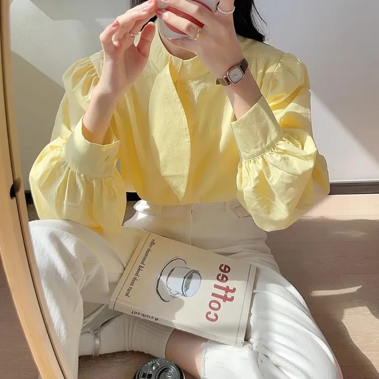 奶黄色长袖衬衫女2025年春季韩国洋气泡泡袖上衣设计感白衬衣薄款