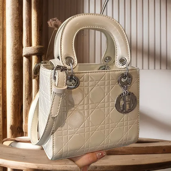 轻奢压花手提戴妃包包女斜挎包2025新款高级质感潮百搭单肩小方包