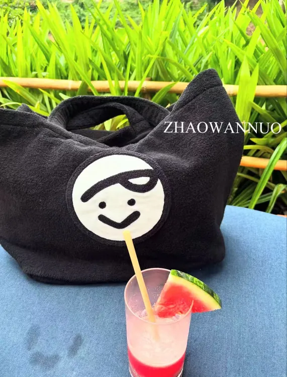 ZHAO WANNUO 丨高尔夫毛圈布笑脸手提包NC1090
