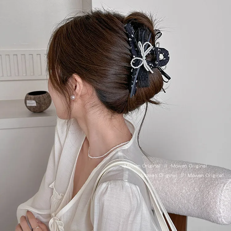甜美珍珠蝴蝶结抓夹女高级感2025新款发夹后脑勺鲨鱼夹子头饰发卡