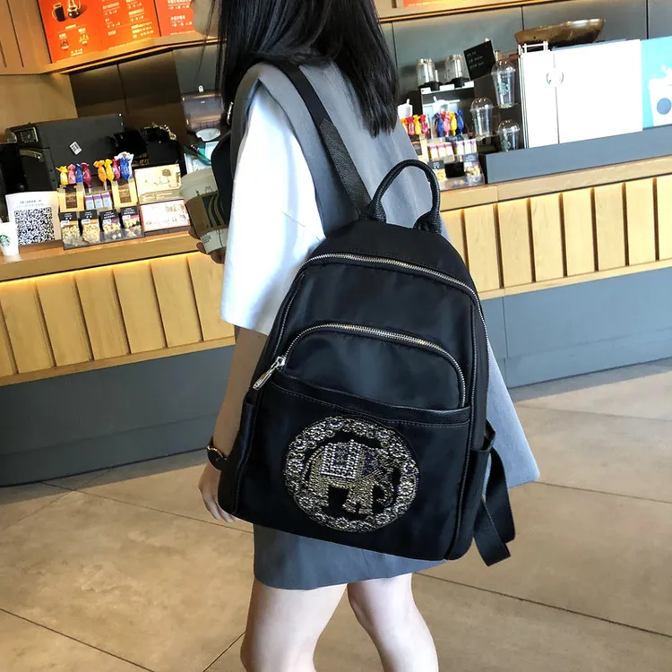 新款2025韩版个性大容量烫钻双肩包女包高级感防水百搭背包旅行包