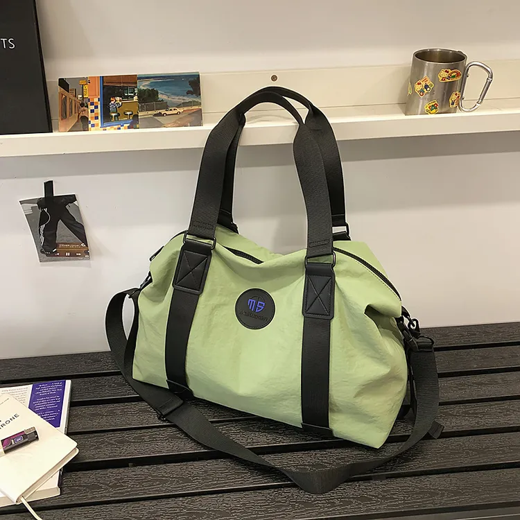 2025新款旅行包女大容量轻便手提包男短途出差行李袋水洗布健身包