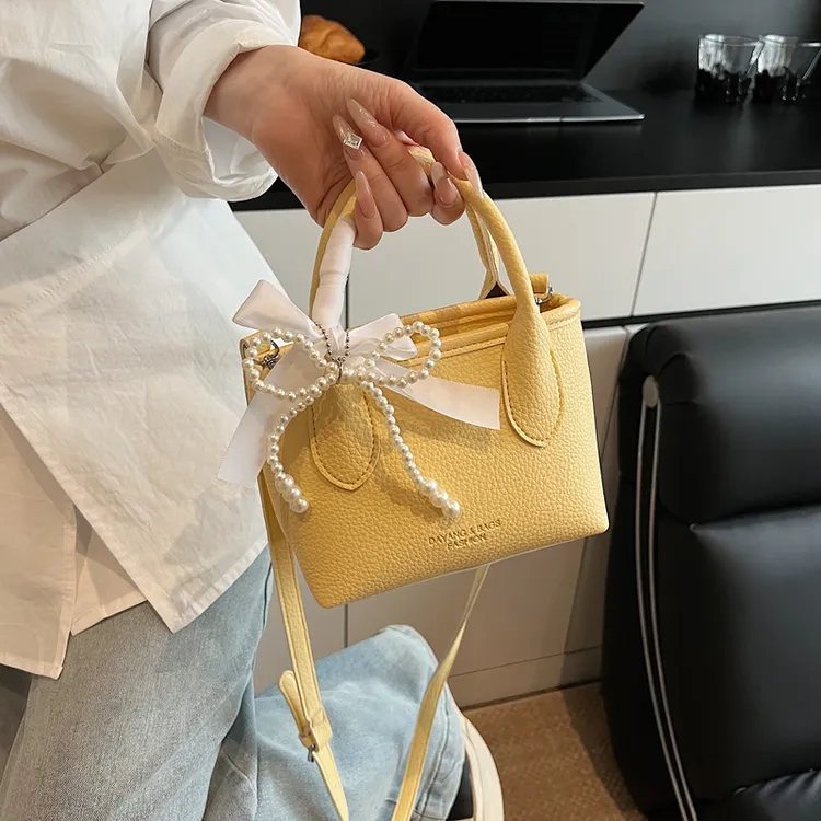 夏季小包包女2025新款百搭单肩斜挎包简约爆款今年流行手提水桶包