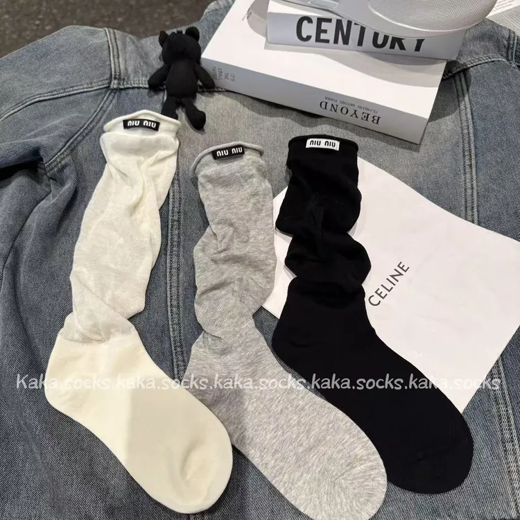 欧货薄透夏季薄款无骨字母布标ins运动个性洋气小腿堆堆袜