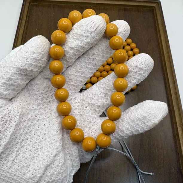 毕业级全品正圆光珠猴头手串手持脖挂