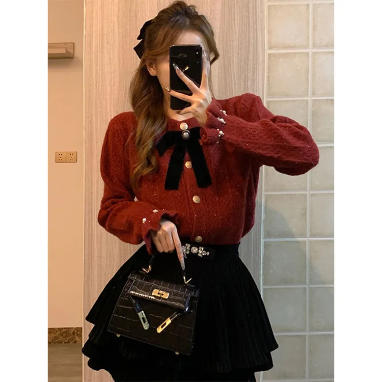 秋冬温柔系穿搭女2025新款韩版气质减龄针织毛衣蛋糕短裙两件套潮